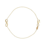 Revere 9ct yellow gold charm bracelet 7.5in, UK version