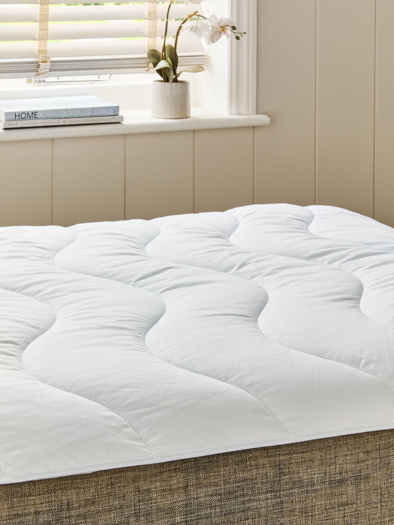 White temperature regulating deep filled mattress protector (British brand)
