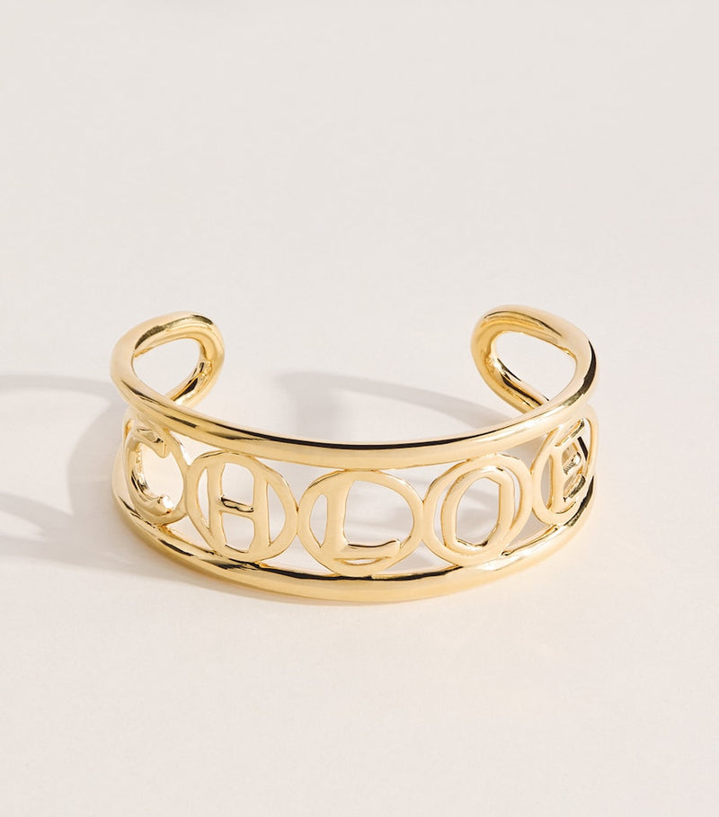 Chloé Script Cuff Bracelet in aged gold-tone brass (British brand)