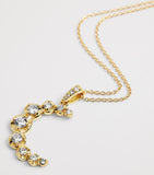 Jennifer Meyer moon necklace in yellow gold with diamonds (British brand)