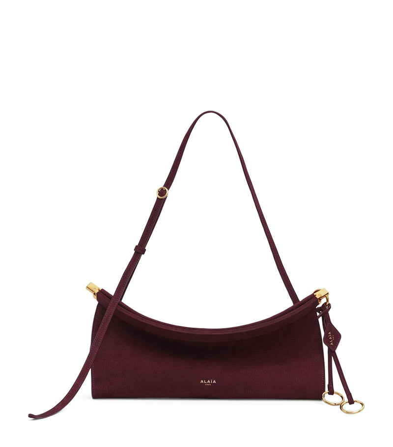 Alaïa Le Click East West shoulder bag, imported from the UK