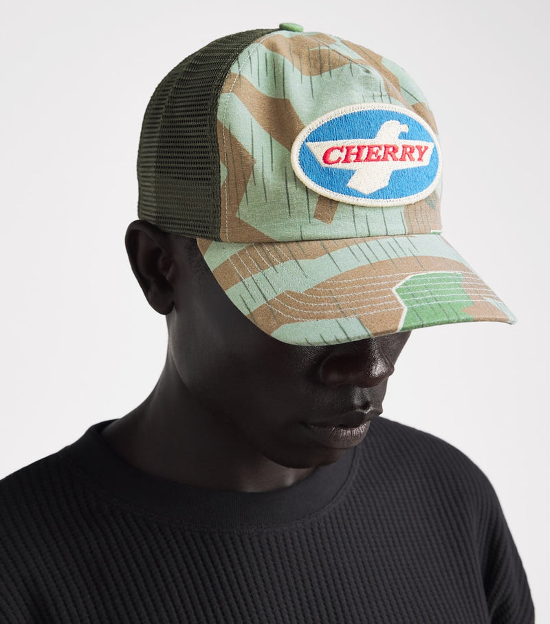 Cherry Los Angeles trucker cap with camouflage and eagle patch (British brand)