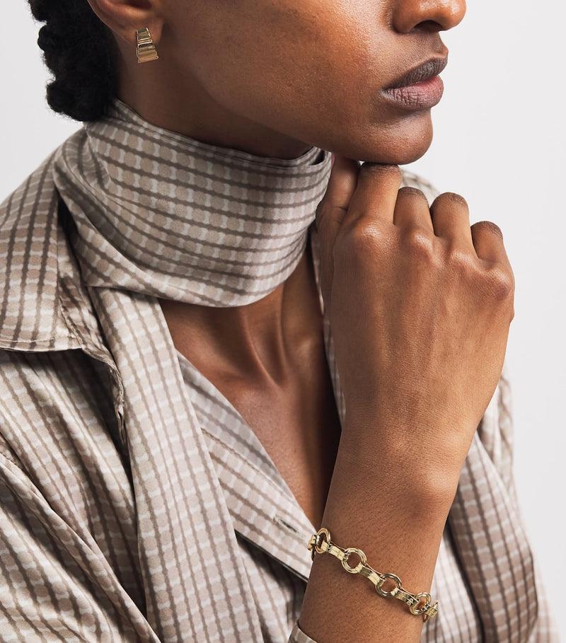 Azlee large yellow gold Escalier hoop earrings, imported from the UK