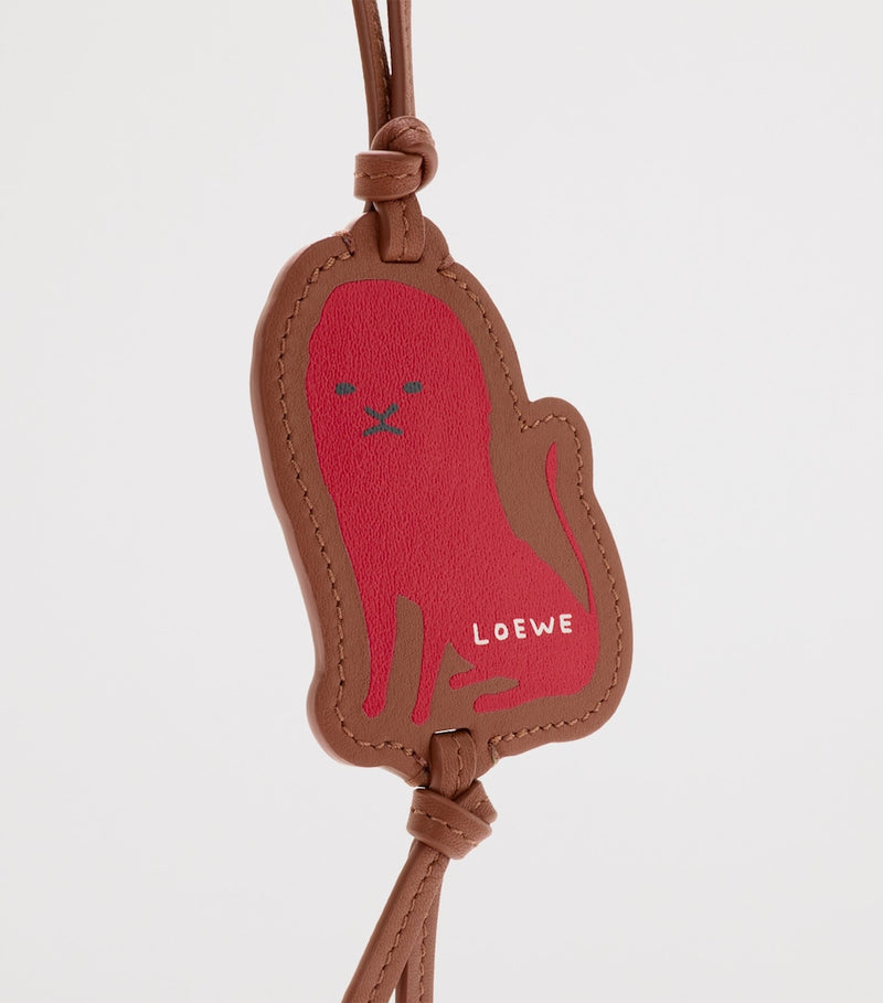 LOEWE leather tag bag charm with lion motif, UK version