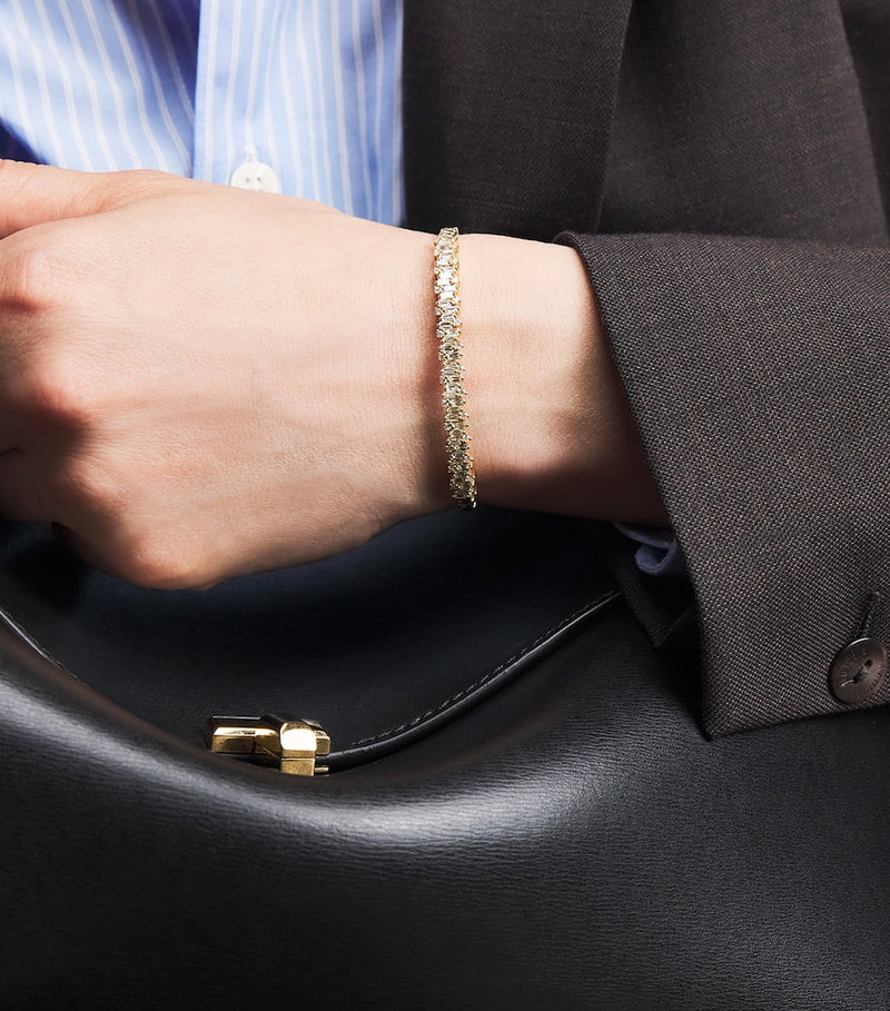Suzanne Kalan yellow gold and diamond bangle (British brand)