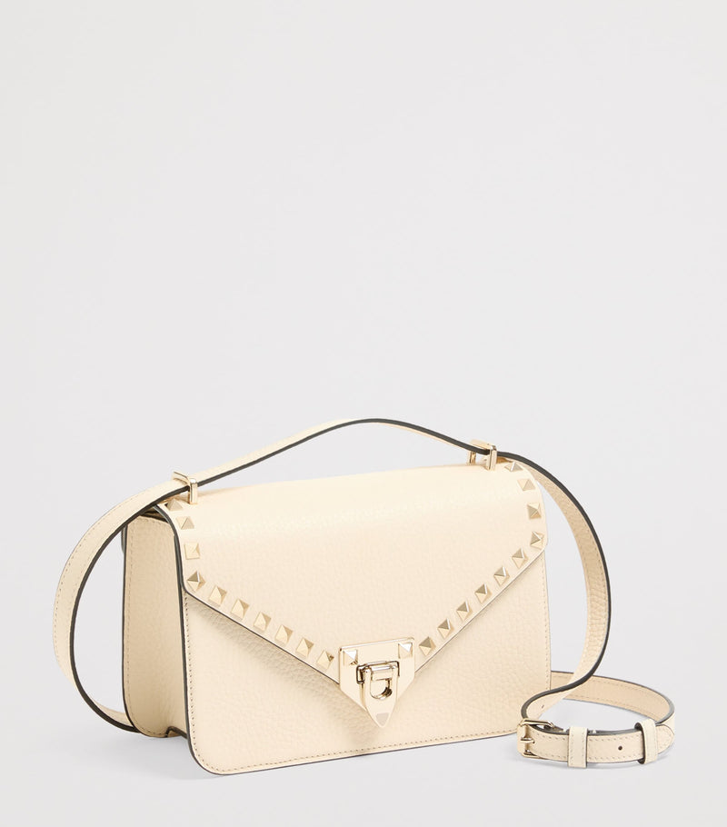 Valentino Garavani small leather Rockstud shoulder bag (British brand)