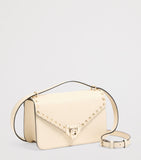 Valentino Garavani small leather Rockstud shoulder bag (British brand)