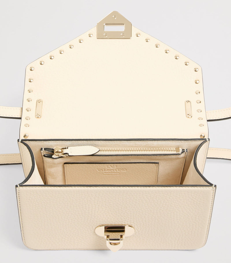 Valentino Garavani small leather Rockstud shoulder bag (British brand)