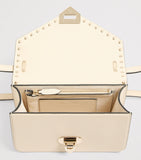 Valentino Garavani small leather Rockstud shoulder bag (British brand)