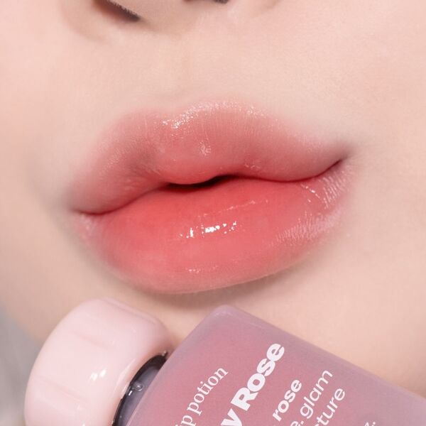 Alternative Stereo Lip Potion Balmy Rose in Honey Coral, imported from the UK