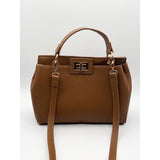 SVNX brown faux leather handbag with gold trim, imported from the UK