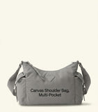 Prada Re-Nylon Explore shoulder bag with leather trims, imported from the UK