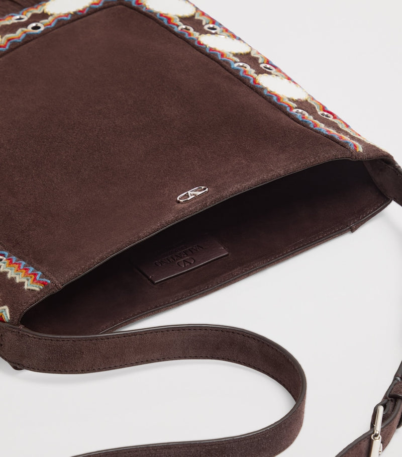 Valentino Garavani medium suede Nellcôte cross-body bag, imported from the UK