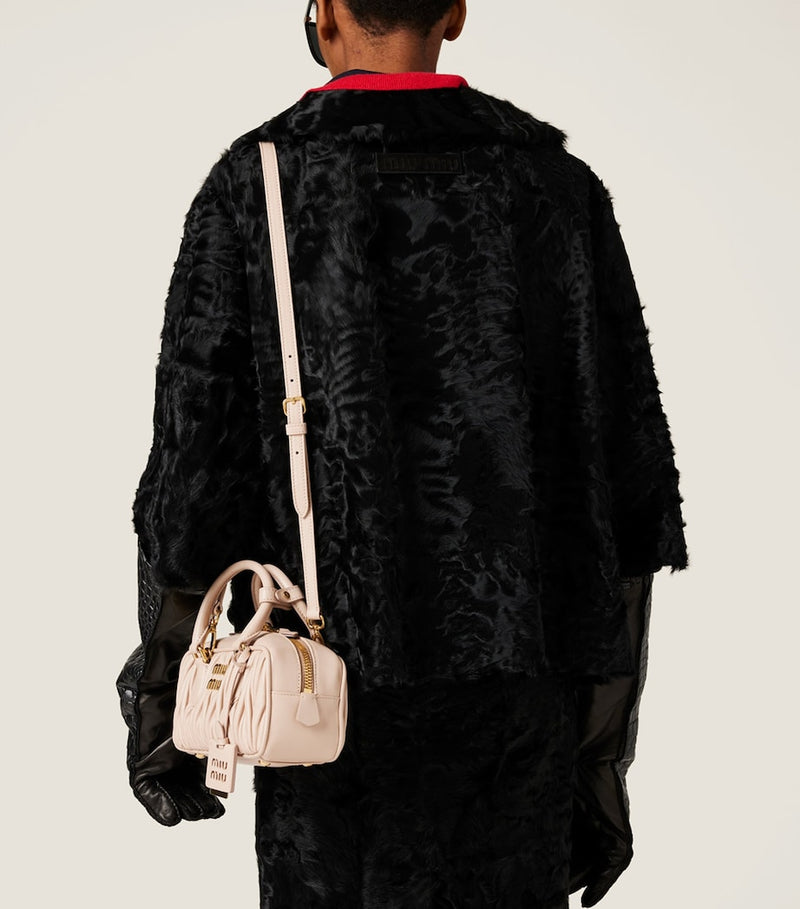 Miu Miu Arcadie matelassé leather top-handle bag, imported from the UK