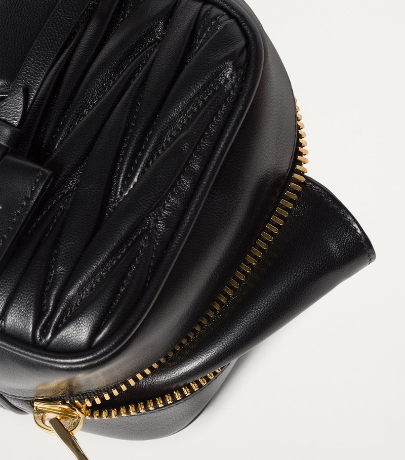 Miu Miu Arcadie top-handle bag imported from the UK