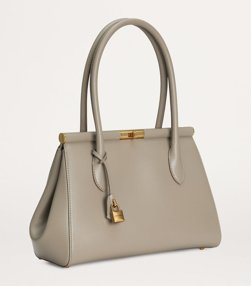 Dolce&Gabbana leather top-handle bag with gold-tone hardware, imported from the UK