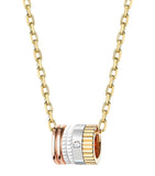 Boucheron Mini Mixed Gold Quatre white ring pendant (British brand)