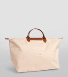 Longchamp small Le Pliage travel bag, imported from the UK