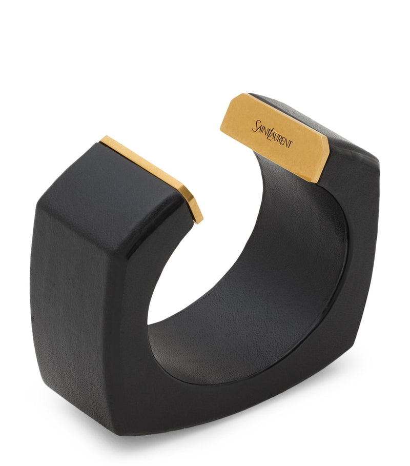 Saint Laurent leather cuff bracelet with gold-tone tip - British product