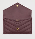 Saint Laurent Cassandre Matelassé envelope wallet (British brand)