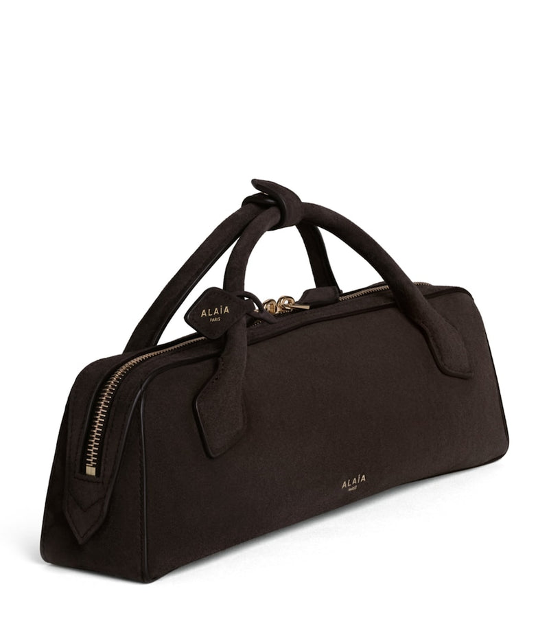 Alaïa Le Teckel suede clutch bag (British brand)