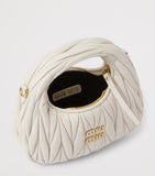 Miu Miu Wander matelassé leather top-handle bag (British brand)
