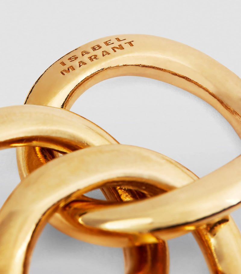 Isabel Marant multi-hoop earrings in polished brass, imported from the UK