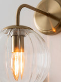 Brass Bourton wall light with swirl glass shade, imported from the UK