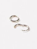 Oliver Bonas silver tone juniper mini huggie earrings, imported from the UK