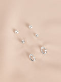 Silver tone initial stud earrings pack (British brand)