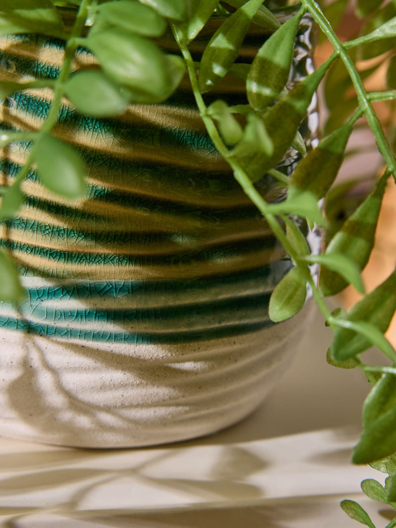 Green artificial trailing plant in reactive ceramic pot, 33cm height, UK version
