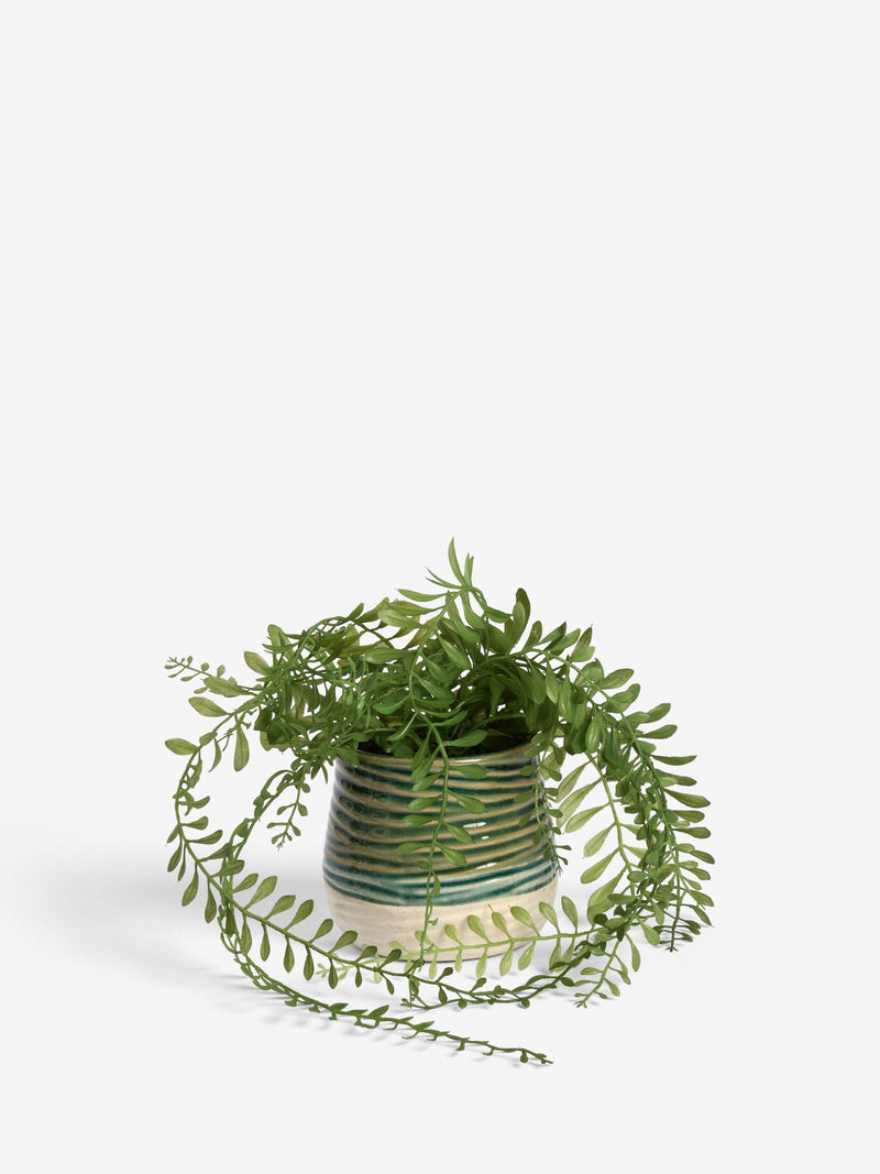 Green artificial trailing plant in reactive ceramic pot, 33cm height, UK version