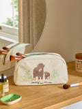 Makeup bag featuring Hamish the Highland Cow design, imported from the UK