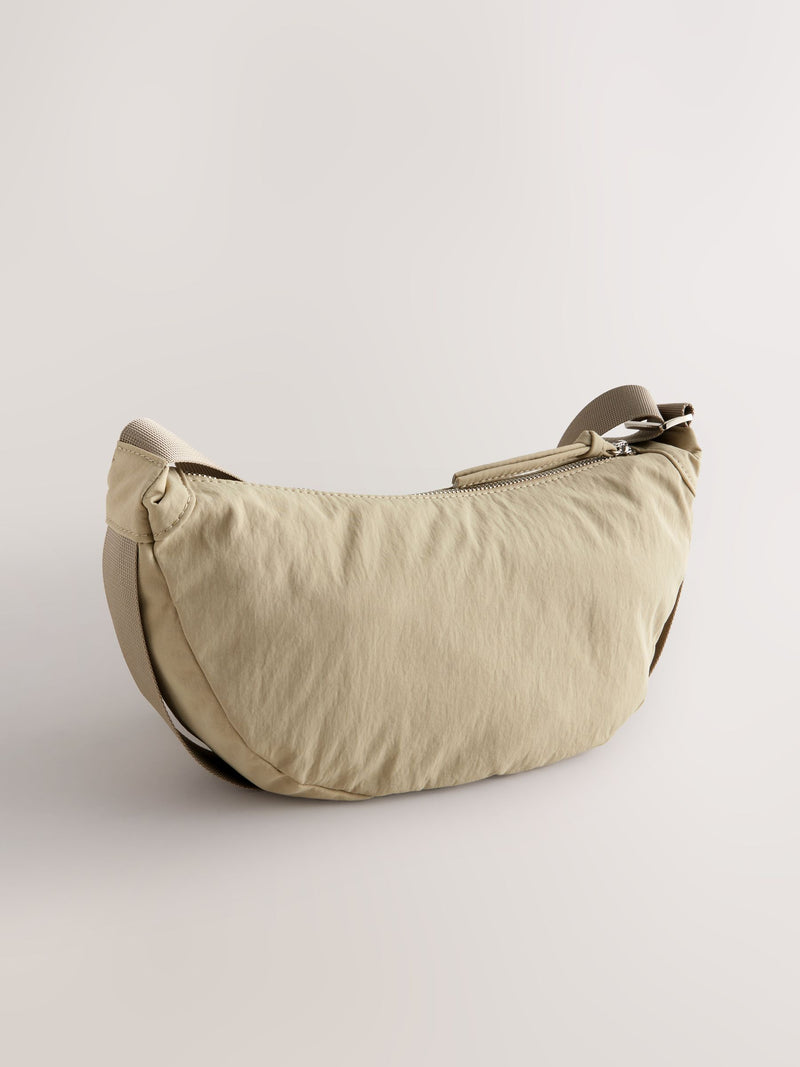 Stone sling bag with adjustable strap, imported from the UK