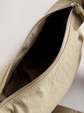 Stone sling bag with adjustable strap, imported from the UK