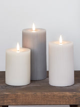 Next Lights4fun Grey TruGlow Ribbed Pillar LED Candle Trio with 10cm, 12.5cm, 15cm Heights- Buy online at McGrocer
