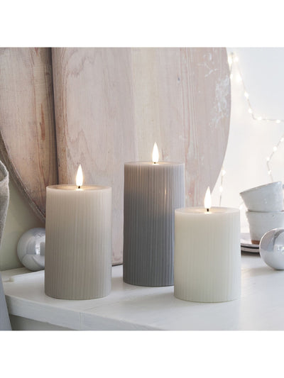 Next Lights4fun Grey TruGlow Ribbed Pillar LED Candle Trio with 10cm, 12.5cm, 15cm Heights- Buy online at McGrocer