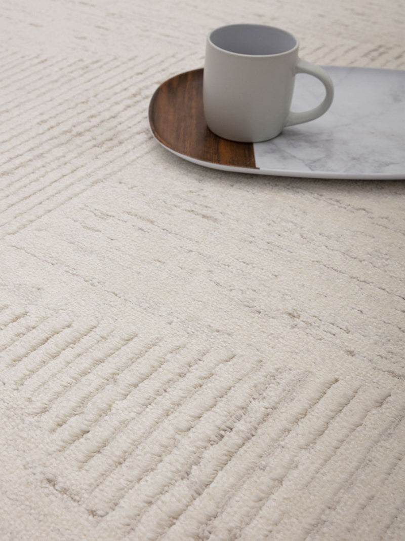 The Rug Edit Cream Axel Linear rug (British brand)