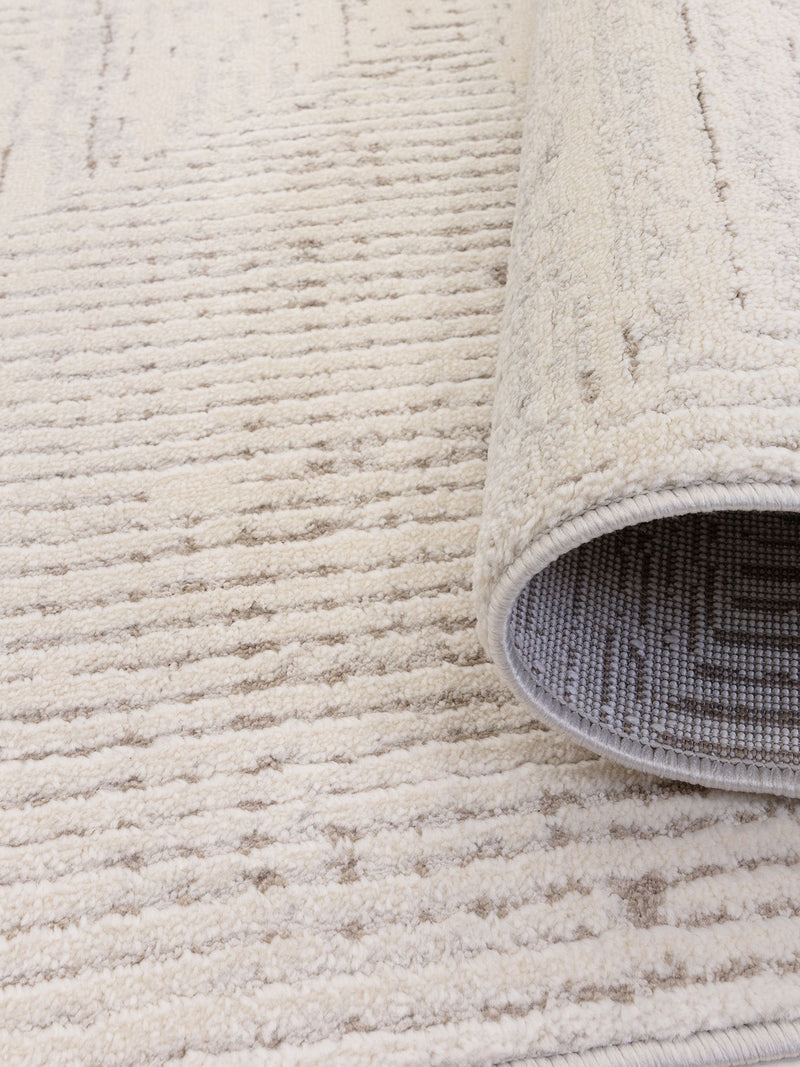 The Rug Edit Cream Axel Linear rug (British brand)