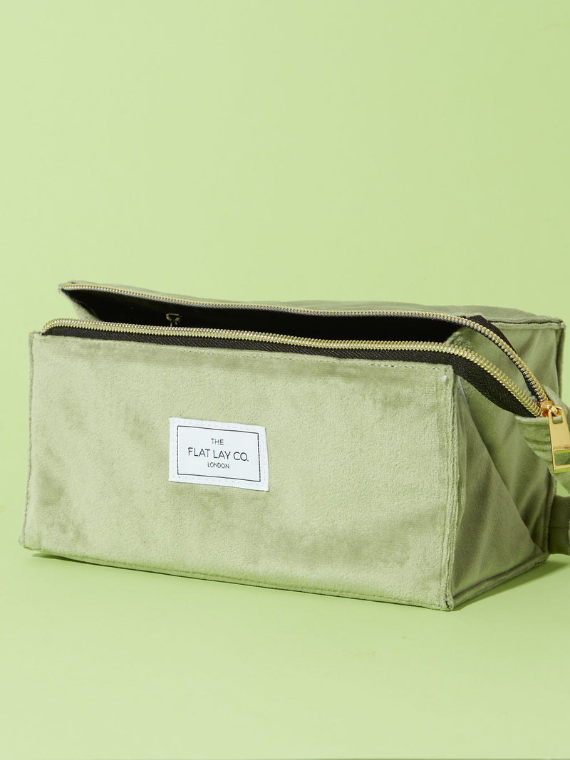 Flat Lay Co. sage green velvet makeup bag (British brand)