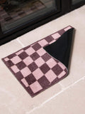 Artsy Mats brown wavey checkerboard indoor washable doormat, imported from the UK