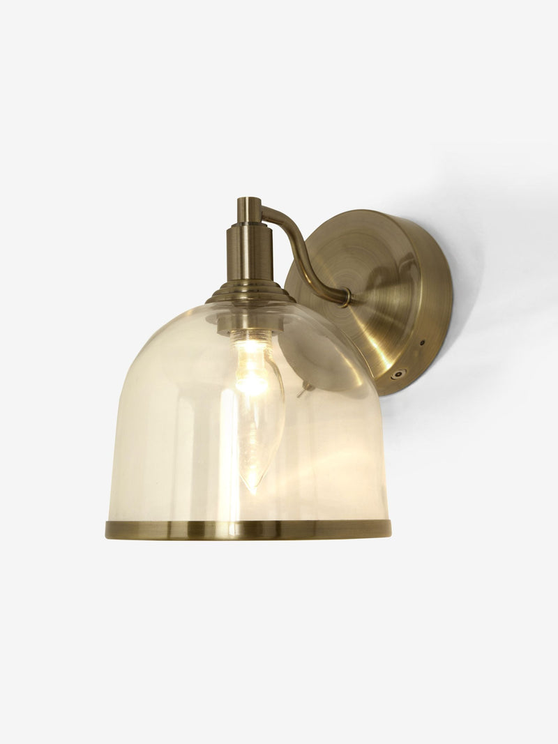 Gloucester wall light with clear glass and brass accents, UK version