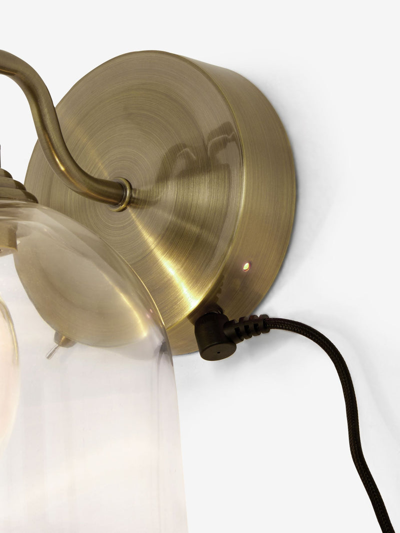 Gloucester wall light with clear glass and brass accents, UK version