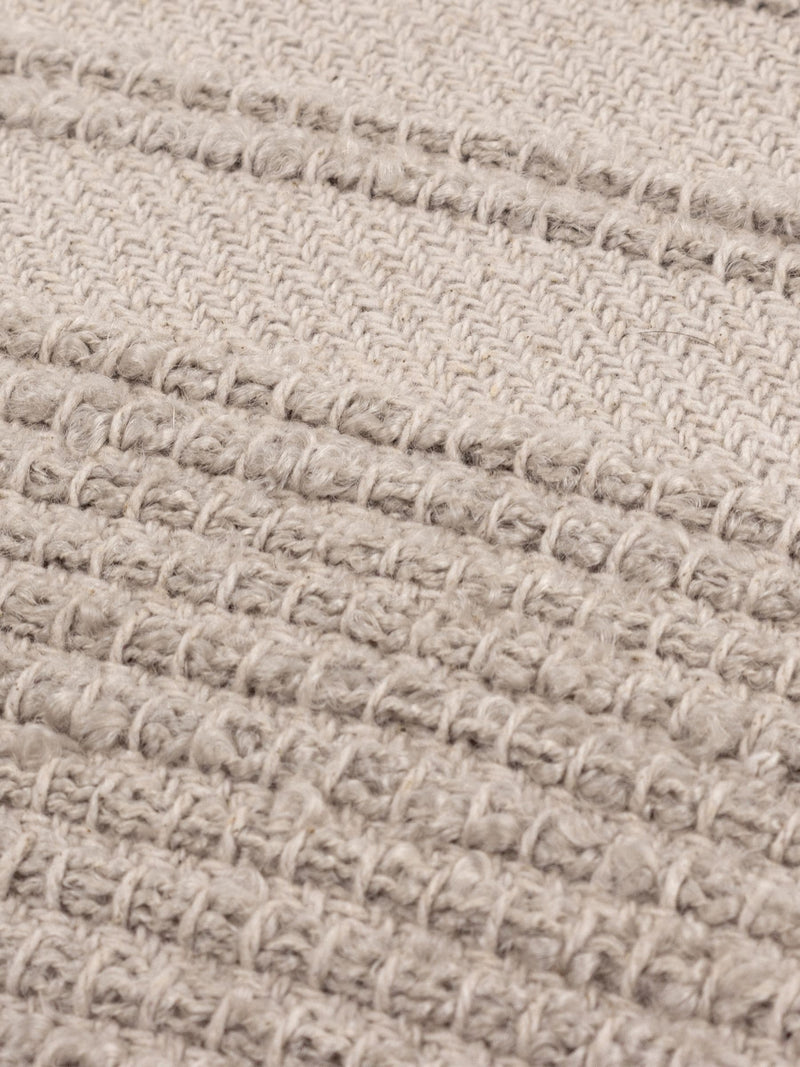 Yard Stone Larch woven tasselled cushion 45cm, imported from the UK