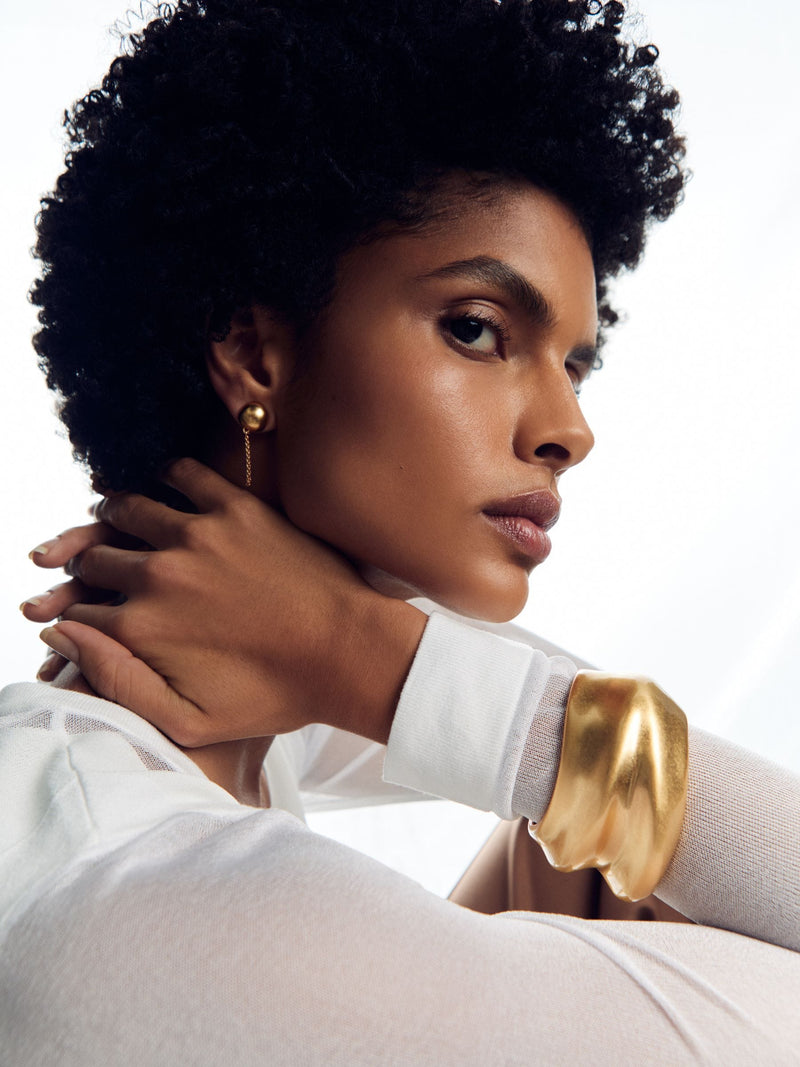 Reiss gold tone Sara sculptural cuff, imported from the UK