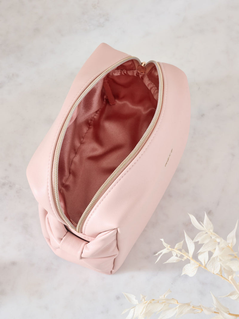 Pink faux leather bow detail makeup bag, imported from the UK