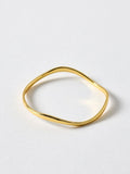 Oliver Bonas Gold Tone Naia Ripple Wave bangle, imported from the UK