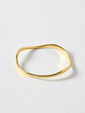 Oliver Bonas Gold Tone Naia Ripple Wave bangle, imported from the UK