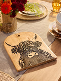 Wooden serving board with Hamish the Highland Cow design 27x34cm, imported from the UK