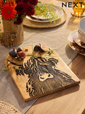 Wooden serving board with Hamish the Highland Cow design 27x34cm, imported from the UK